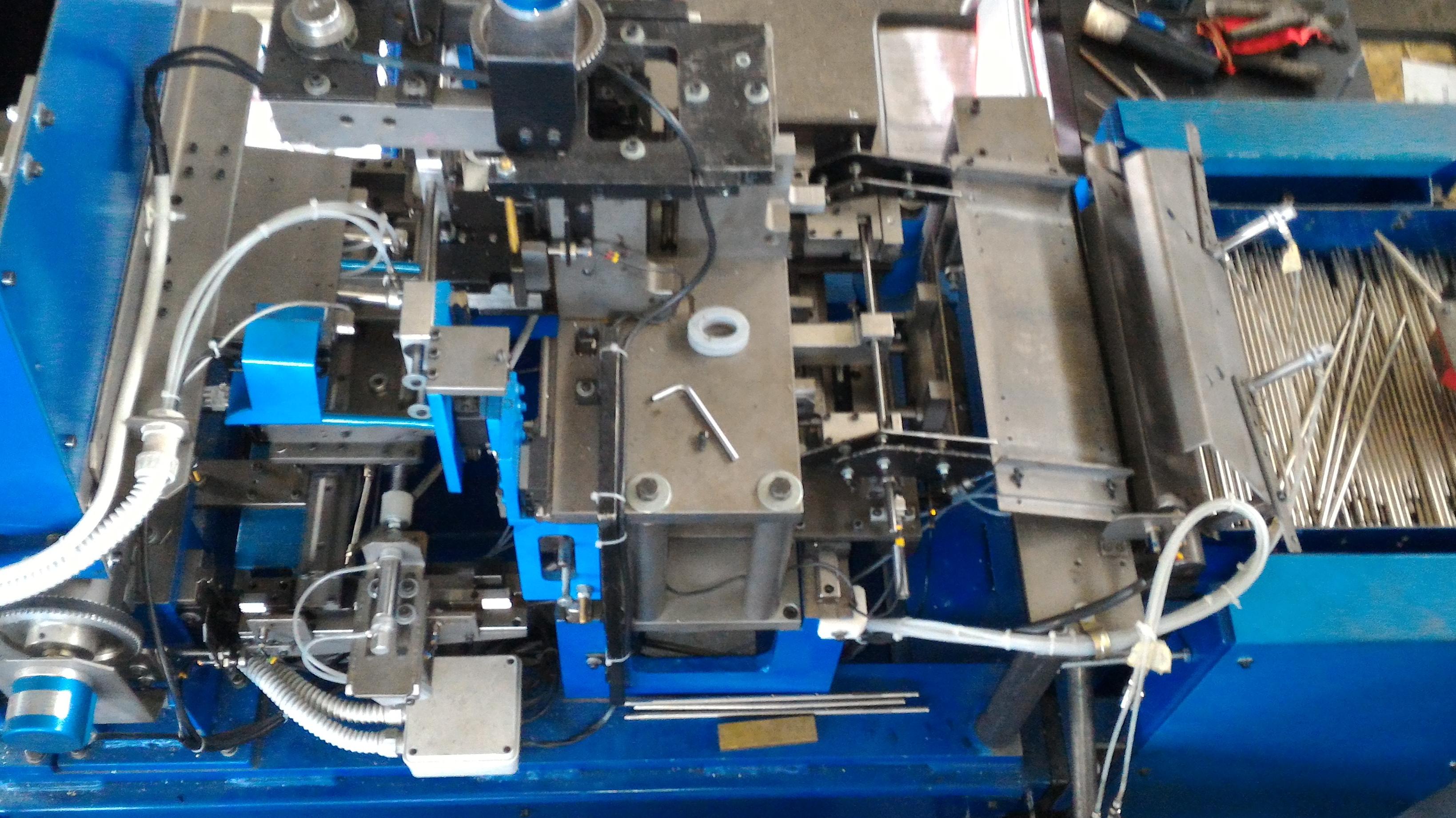 Macchina speciale per il controllo assiale degli alberi