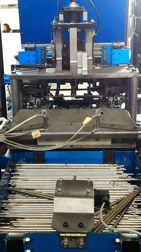 Macchina speciale per il controllo assiale degli alberi